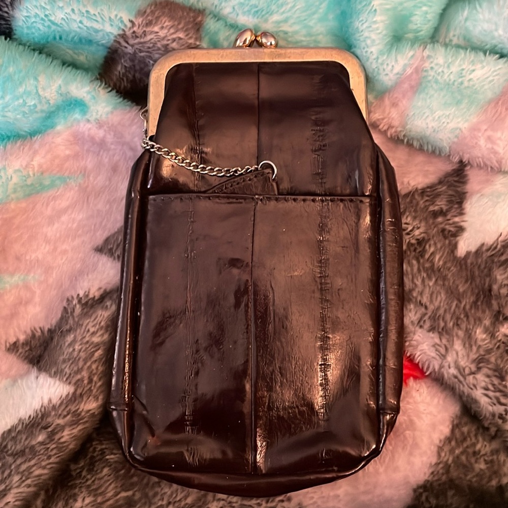 Vintage cigarettes case with lighter holder attached